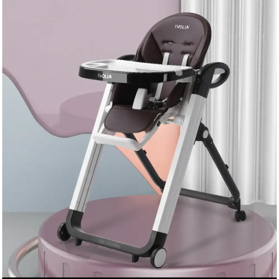 Brown and black ivolia brand baby high chair with a sleek, modern design featuring padded seating, adjustable tray, and wheels for mobility.