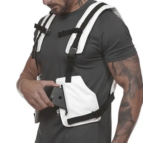 White tactical chest harness with black straps and buckles, featuring a front pocket designed to hold a smartphone.