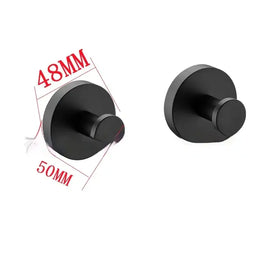Black matte-finished wall-mounted hooks with a sleek, modern design.