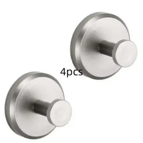 Stainless steel wall-mounted hooks, sleek and circular with a polished metallic finish.