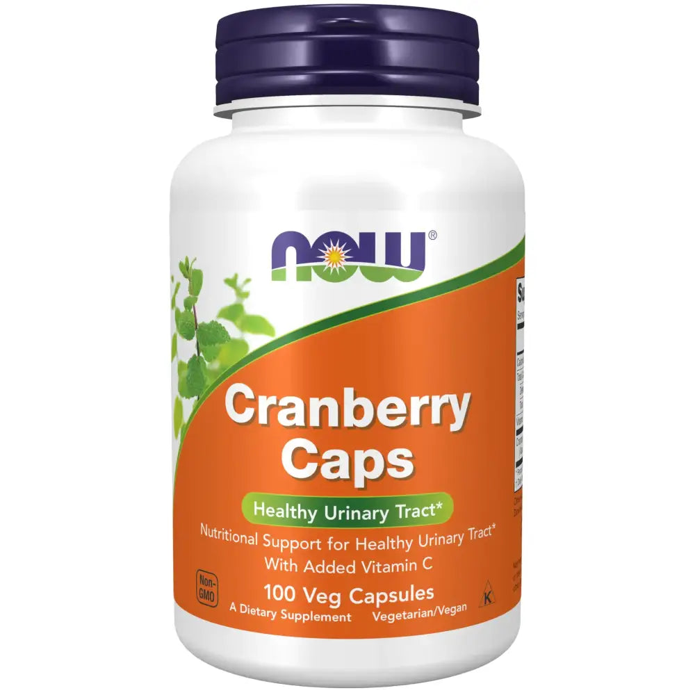 White plastic bottle with a purple cap and an orange label featuring the ’now’ brand name, displaying ’cranberry caps’ as its product.