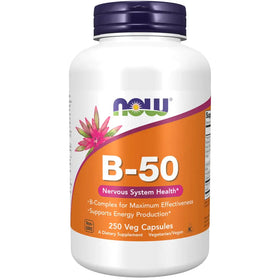 White plastic bottle with a purple cap and an orange label featuring the ’now’ brand logo, b-50 supplement text, and pink flower design.