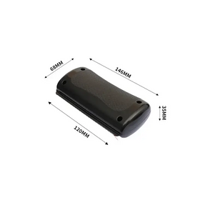 Black plastic handheld device with textured grip surface and rounded edges.