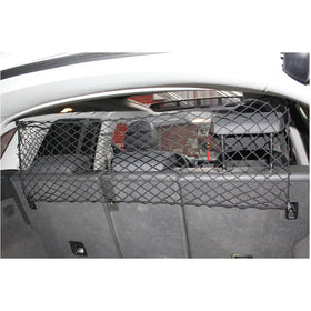 Black mesh cargo net designed to secure items in a car’s trunk.