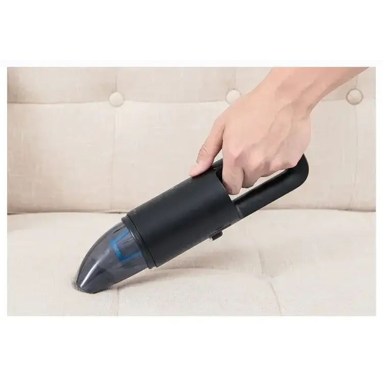 Black handheld vacuum cleaner with a transparent dust collection chamber and blue accent details.