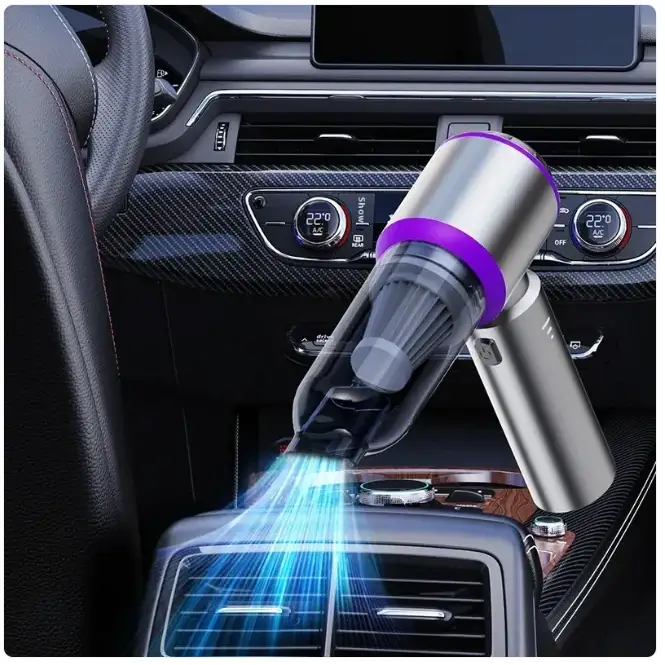 A sleek silver and purple handheld car vacuum with a transparent dust collection chamber.