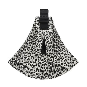 Black and white leopard-print fabric pet carrier with a black adjustable strap.