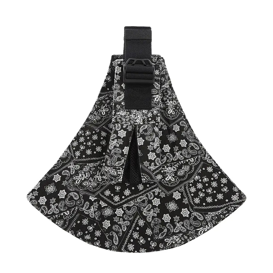 Black bandana-patterned pet carrier with adjustable strap and mesh panel.