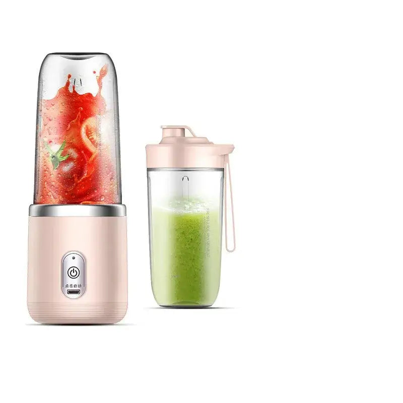Pink portable blender with a clear glass blending cup and silver accent, shown alongside its matching pink lid-and-straw drinking vessel.