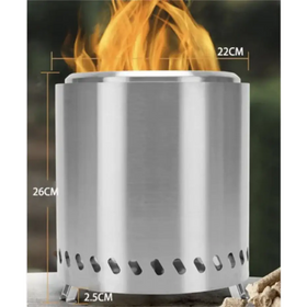 Silver stainless steel cylindrical portable campfire stove with flame burning inside.