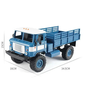 Blue and white die-cast metal remote-controlled truck model with rugged black tires.