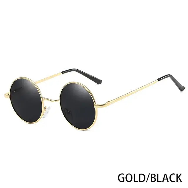 Gold-rimmed round sunglasses with black lenses and black temple tips.