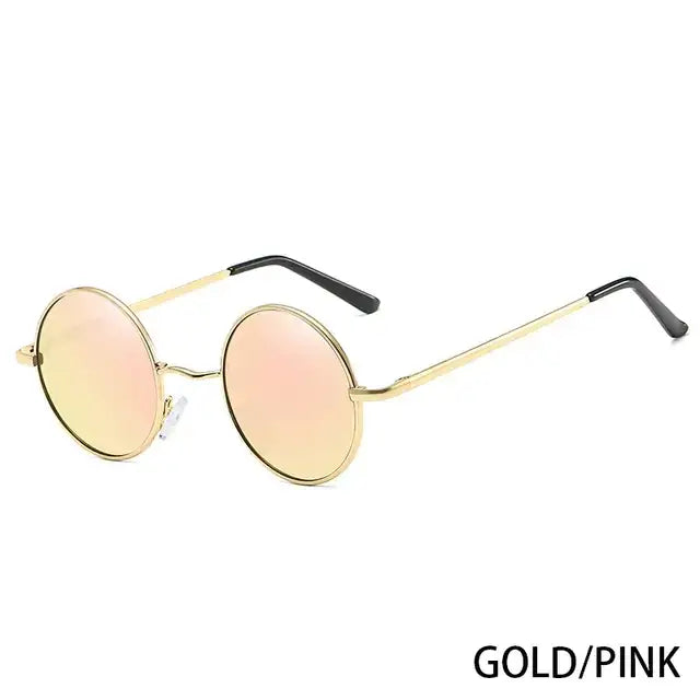 Gold-rimmed round sunglasses with pink mirrored lenses and black temple tips.