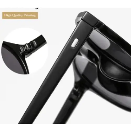 Black-framed sunglasses with sleek, glossy finish and a modern design.
