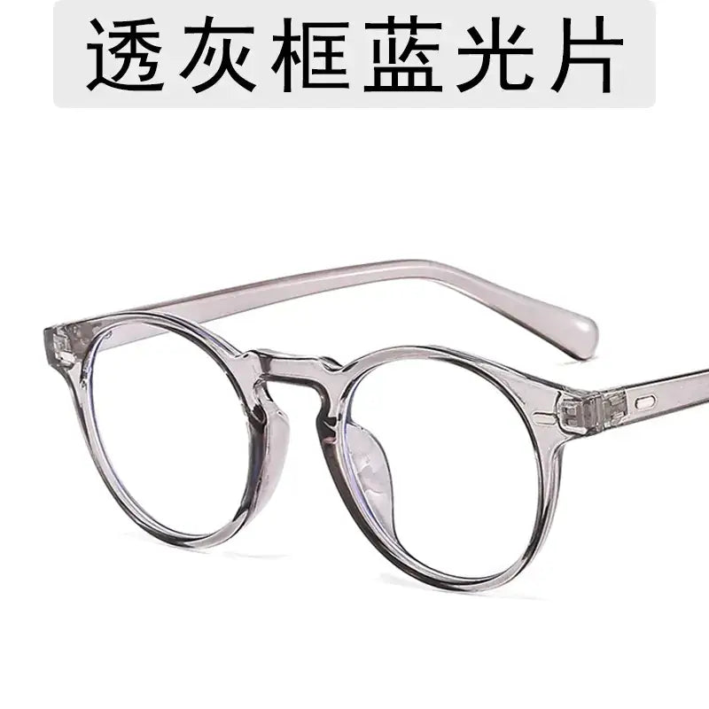 Clear gray-framed glasses with blue light-filtering lenses.