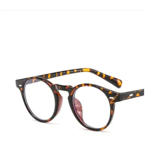 Tortoiseshell-patterned round-framed glasses with a sleek, modern design.