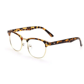 Tortoiseshell-patterned acetate eyeglasses with gold-toned metal rims and clear lenses.