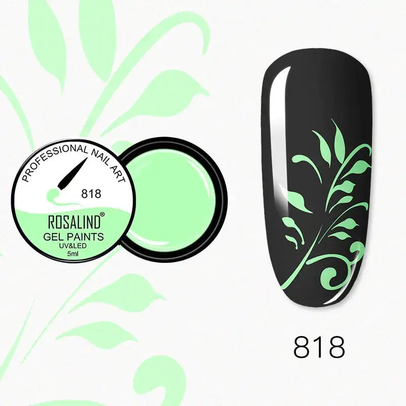 A sleek, glossy black nail with delicate mint green leafy vines painted across its surface.