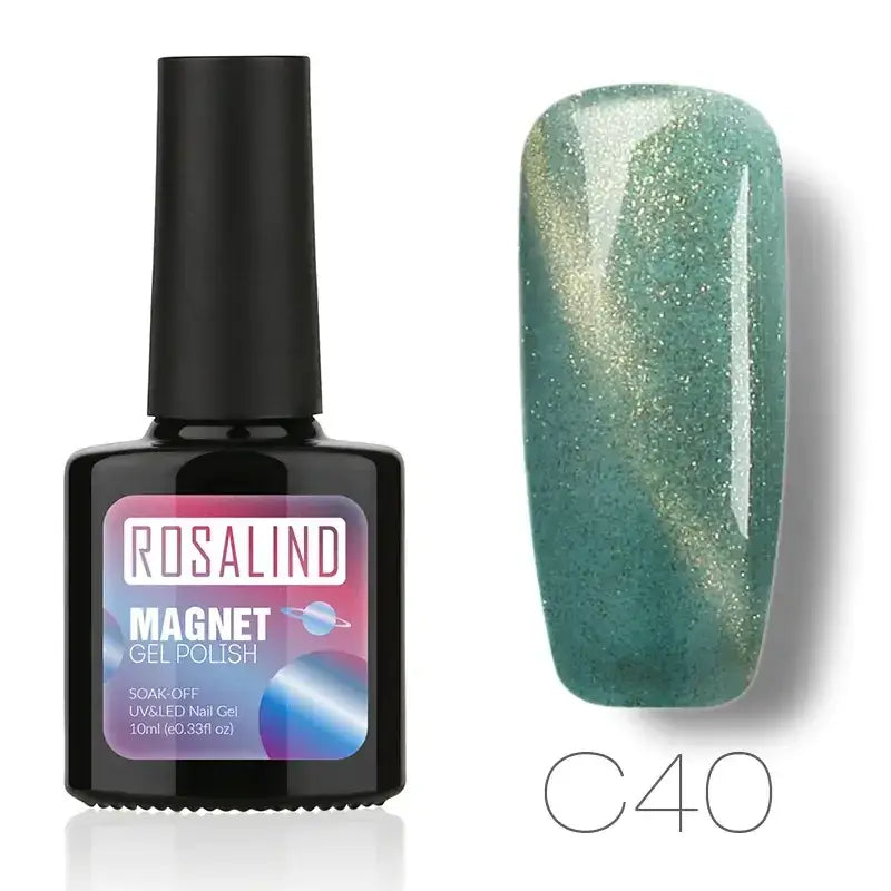 Rosalind magnet gel polish in shade c40, a shimmering teal with gold glitter that shifts under light.