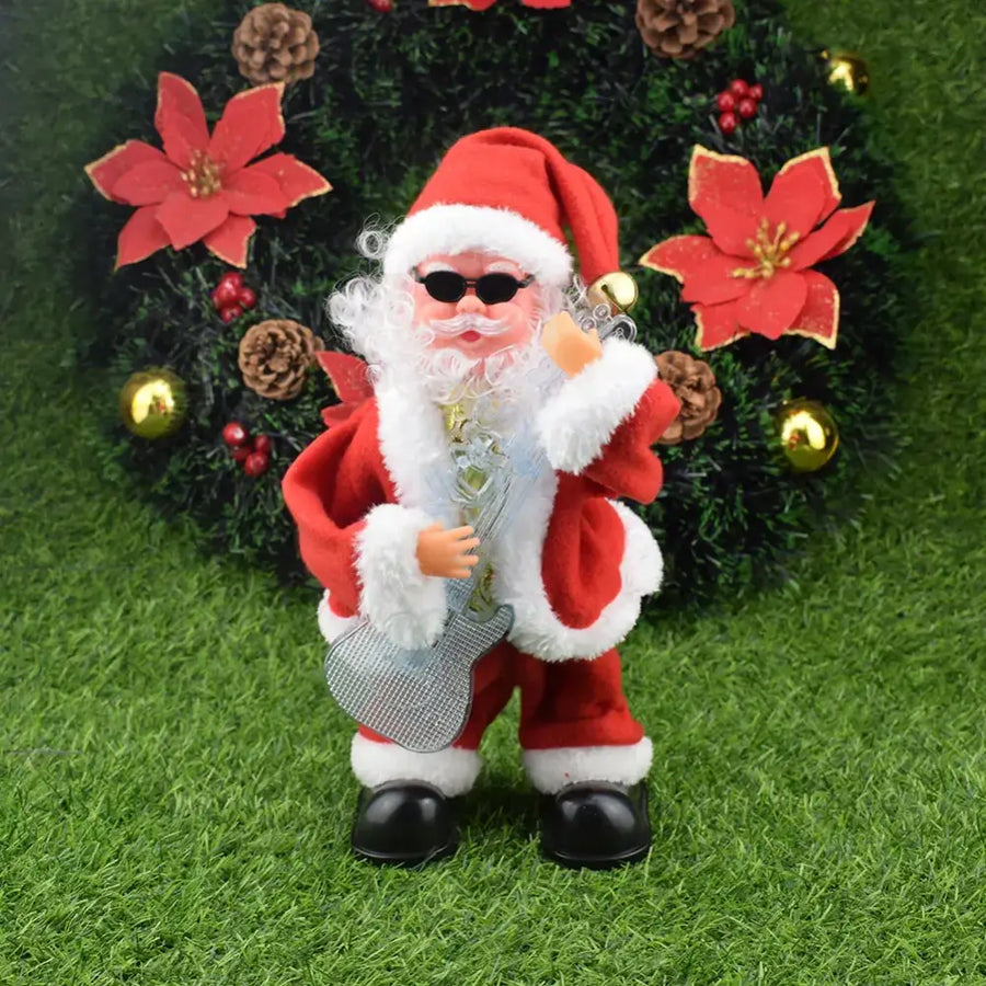 Red and white plush santa claus figurine wearing sunglasses, holding a silver glittery guitar.