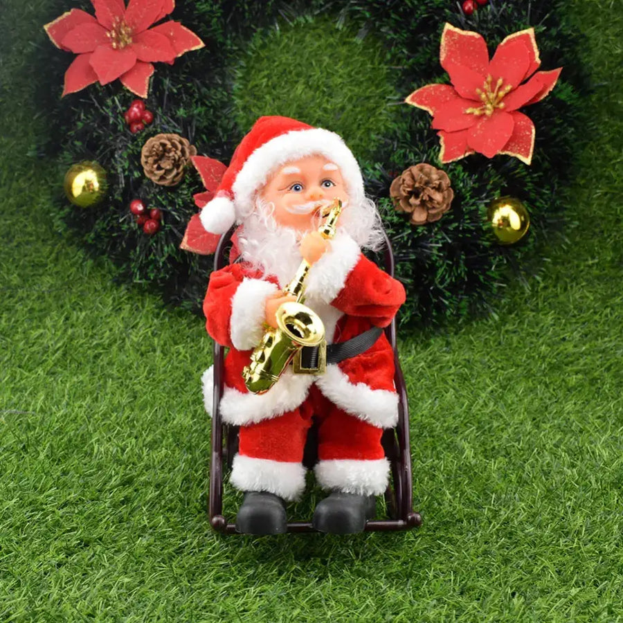Red and white plush santa claus figurine seated in a black chair, holding a golden saxophone.