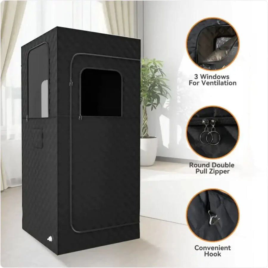 Black fabric sauna tent with a rectangular shape, featuring three ventilation windows and a round double pull zipper.