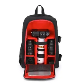Black camera backpack with red interior, designed to hold a dslr camera and multiple lenses.