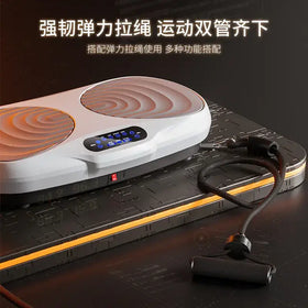 White and black dual-plate electric exercise machine with glowing orange circular patterns on the plates.