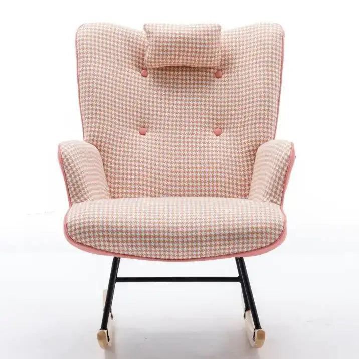 A pink and beige houndstooth patterned rocking chair with a matching cushioned headrest, upholstered in woven fabric and supported by black metal legs with light-colored casters.