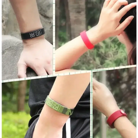 Black digital wristband with white led display showing time
