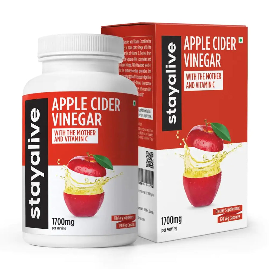 Red and white box with a bottle of stayalive apple cider vinegar capsules, featuring an illustration of a red apple being sliced open by golden liquid.