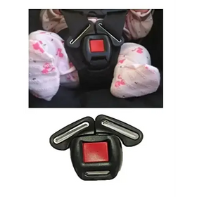 Black car seat belt buckle with a red square button and silver metallic strips.