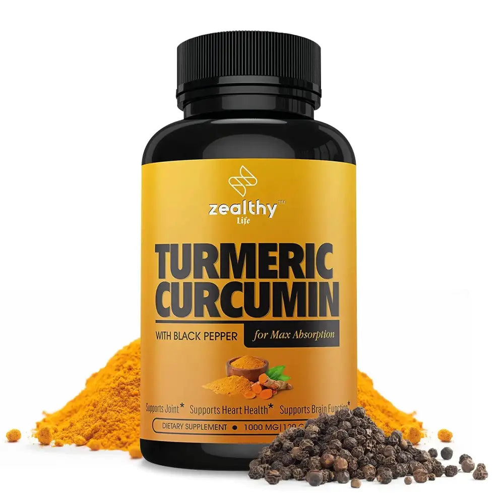 A black bottle with a vibrant yellow label featuring the brand ’zealthy life’ and product name ’turmeric curcumin with black pepper for max absorption,’ surrounded by piles of turmeric powder and whole black peppercorns.