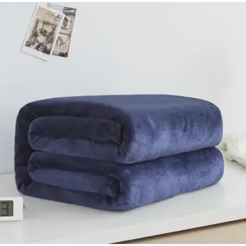 A plush navy blue throw blanket with a soft, velvety texture.