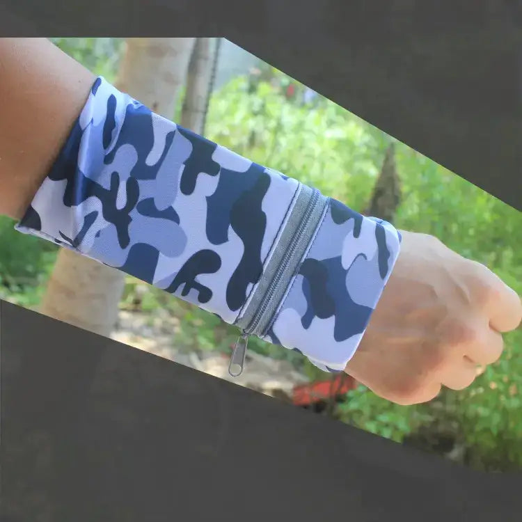 Blue and white camouflage-patterned wristband with a zipper closure.