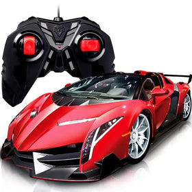 Red and black remote-controlled sports car with silver rims.