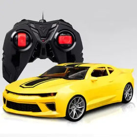 Yellow remote-controlled chevrolet camaro with black racing stripes and silver alloy wheels.