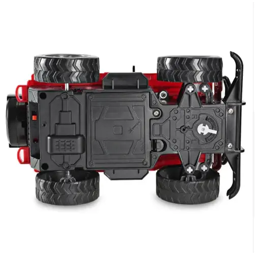 Red and black remote-controlled off-road vehicle with rugged tires and detailed undercarriage.