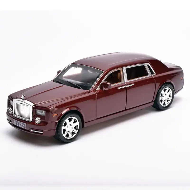 A maroon metallic rolls-royce phantom model car with chrome detailing and silver alloy wheels.