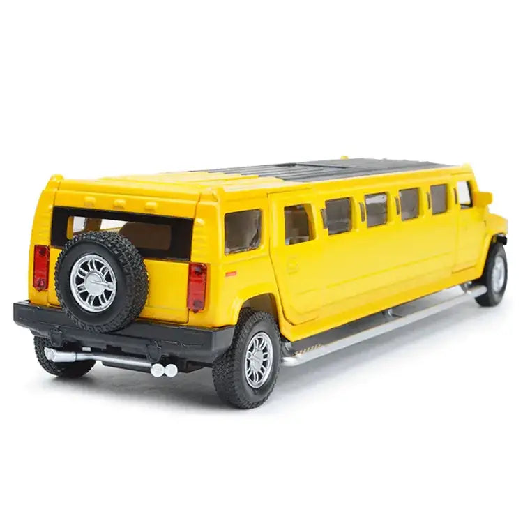 Bright yellow die-cast metal hummer limousine model with black roof, tires, and trim.