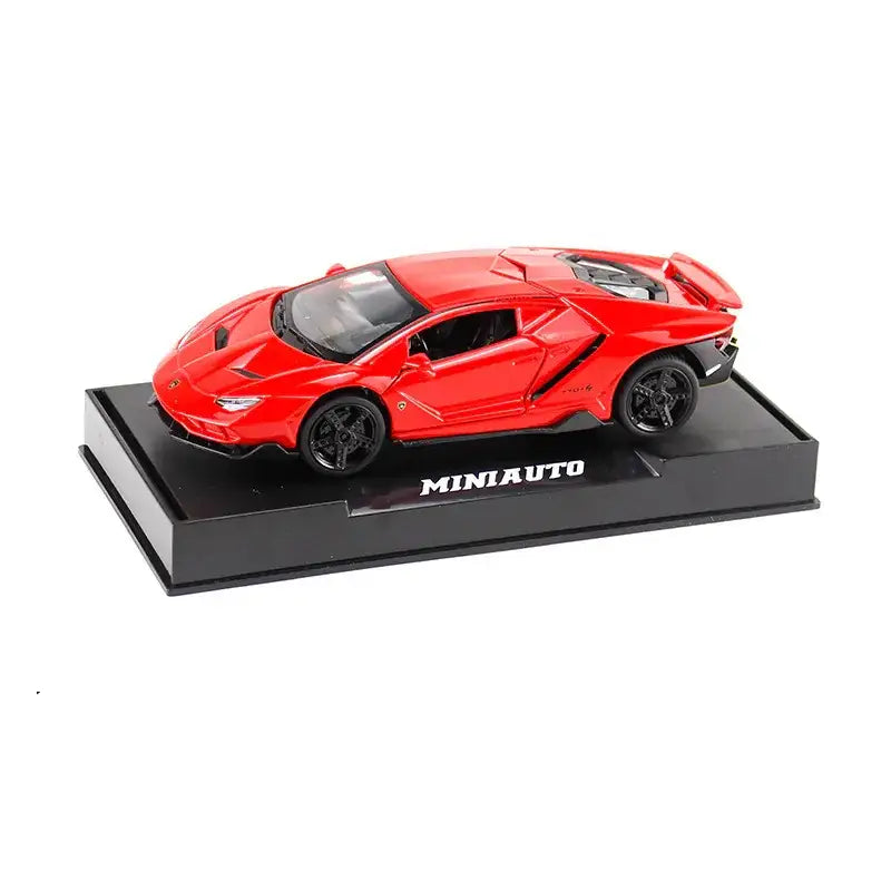 Red die-cast lamborghini centenario model car on a black display base.