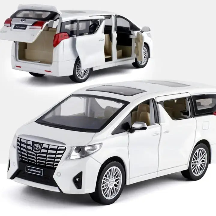 White toyota alphard minivan toy model with detailed interior and open doors.