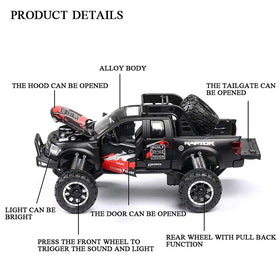 Black alloy toy pickup truck with red and white decals, featuring a rugged design including an open hood, tailgate, and doors.