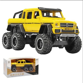 Yellow die-cast mercedes amg g63 toy truck with black accents and oversized tires.