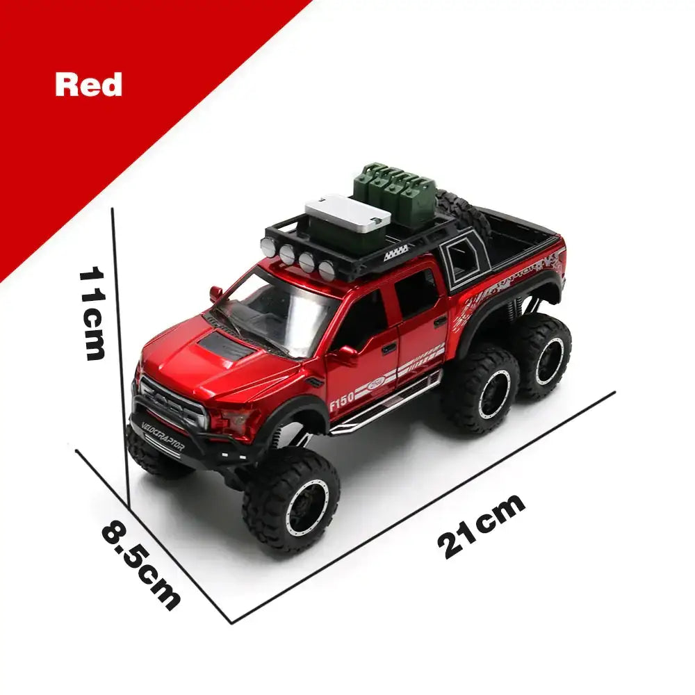 Red die-cast 6x6 off-road pickup truck model with black tires and roof accessories.