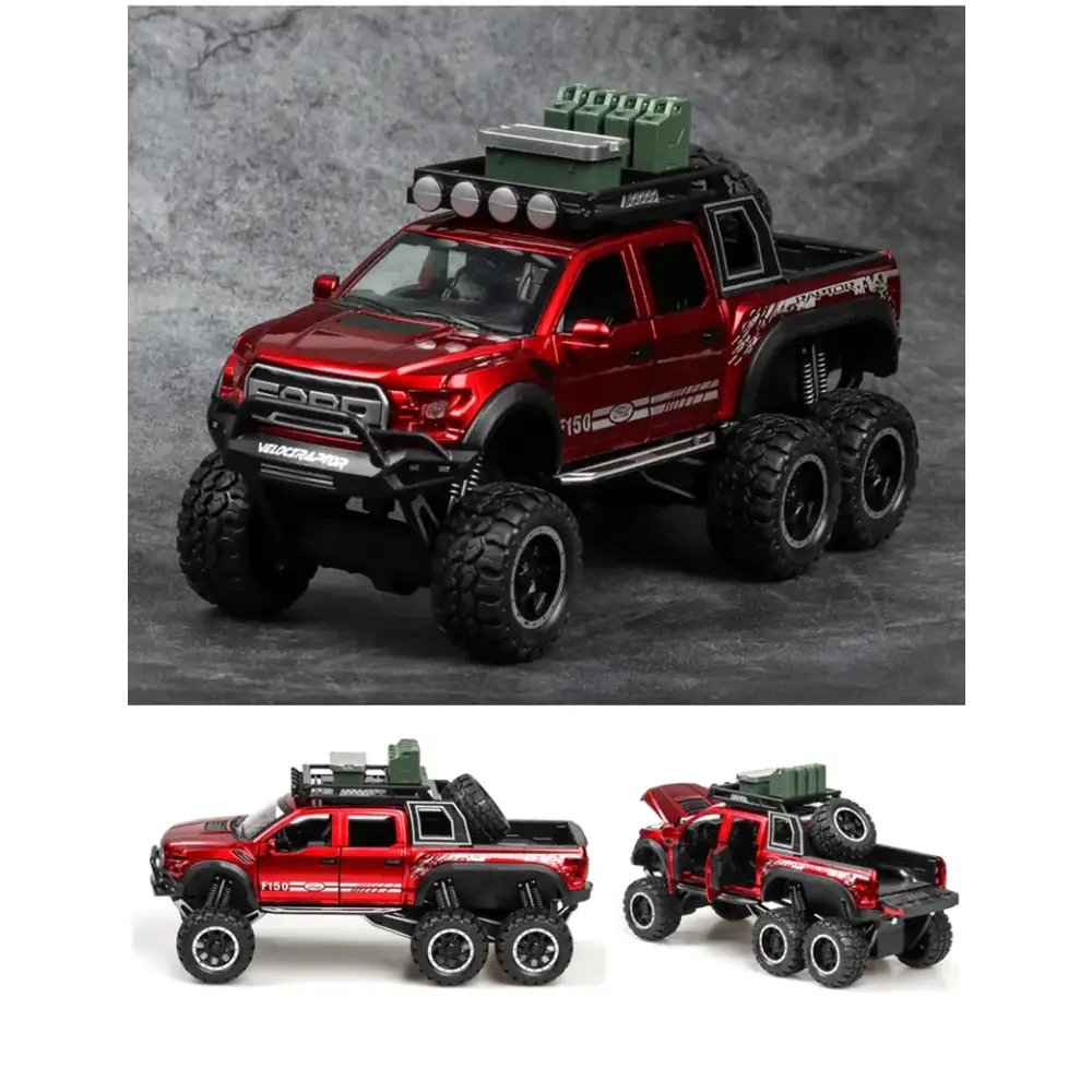 Red die-cast metal 6x6 off-road pickup truck model with black tires and roof-mounted lights.