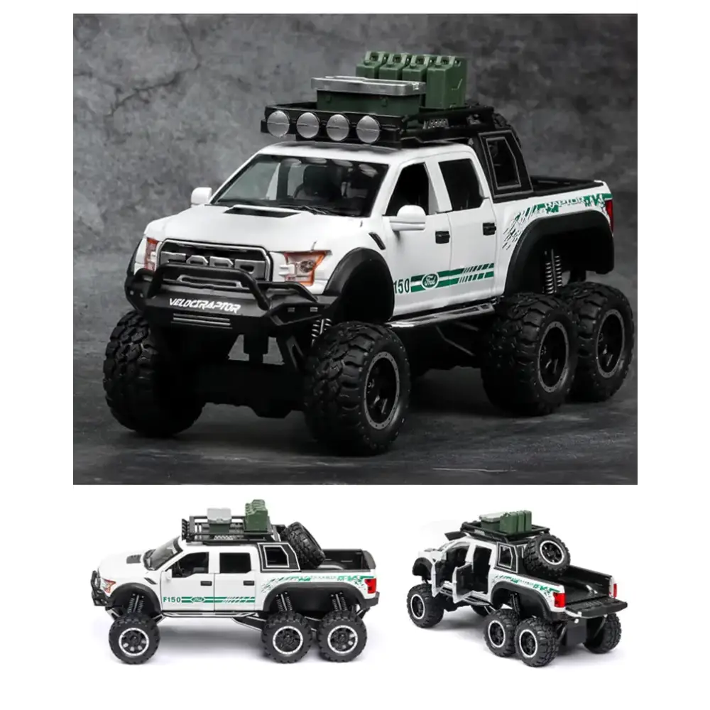 White and green die-cast ford f-150 raptor model truck with six wheels, black off-road tires, roof-mounted lights and cargo containers.