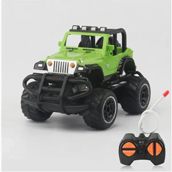 Green remote-controlled jeep with black tires and a white front grille.