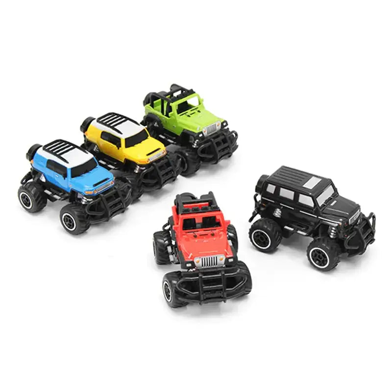 Set of five colorful miniature remote-controlled monster trucks in vibrant blue, yellow, green, red and black with rugged off-road designs.