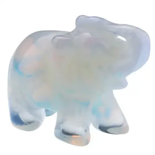 A translucent, iridescent opal elephant figurine with soft blue and white hues.